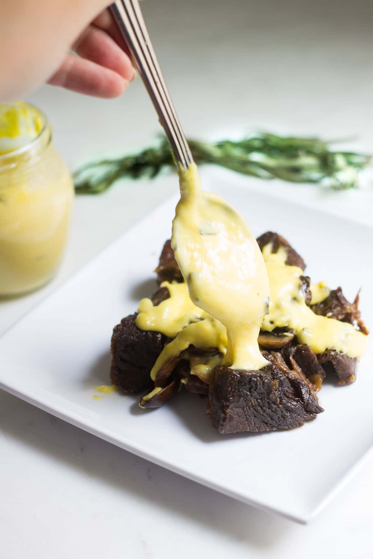 Béarnaise Sauce: a creamy, tarragon-flavored French sauce that's a dream over meat, poultry, and fish! Recipe via MonPetitFour.com