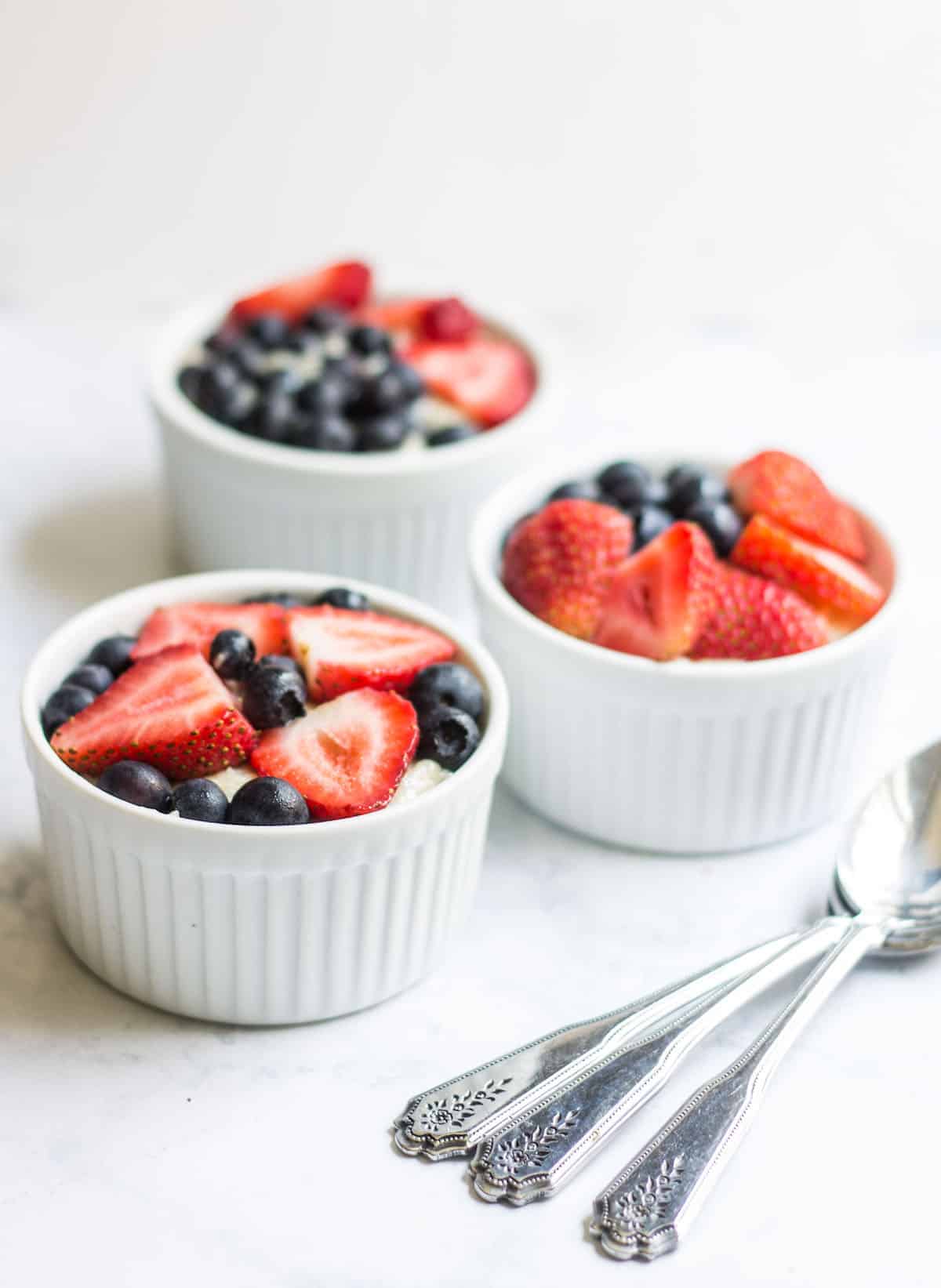 Berry Tarts: easy French tarts made with graham cracker crusts, pastry cream, and fresh berries. Recipe via MonPetitFour.com