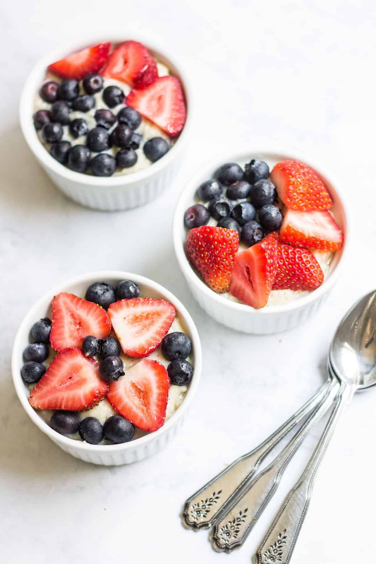 Berry Tarts: easy French tarts made with graham cracker crusts, pastry cream, and fresh berries. Recipe via MonPetitFour.com