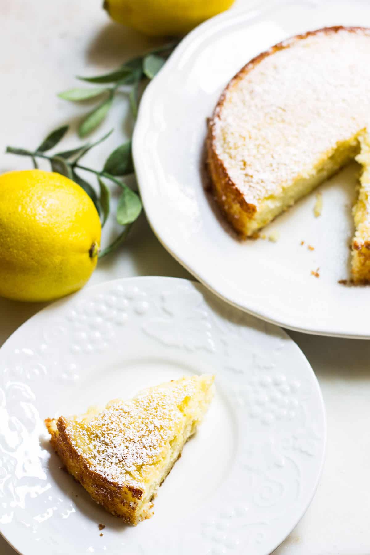 lemon ricotta cake slice on a plate image