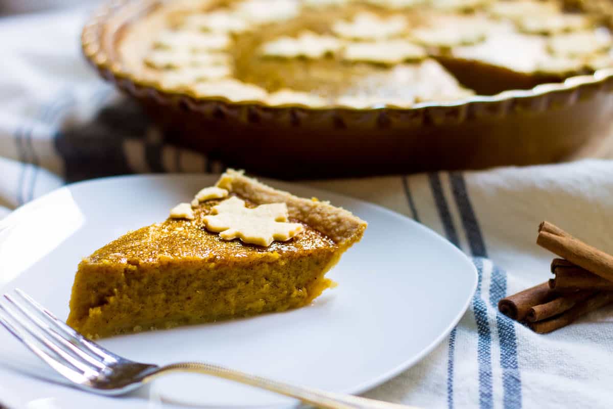 Homemade Pumpkin Pie slice on a plate