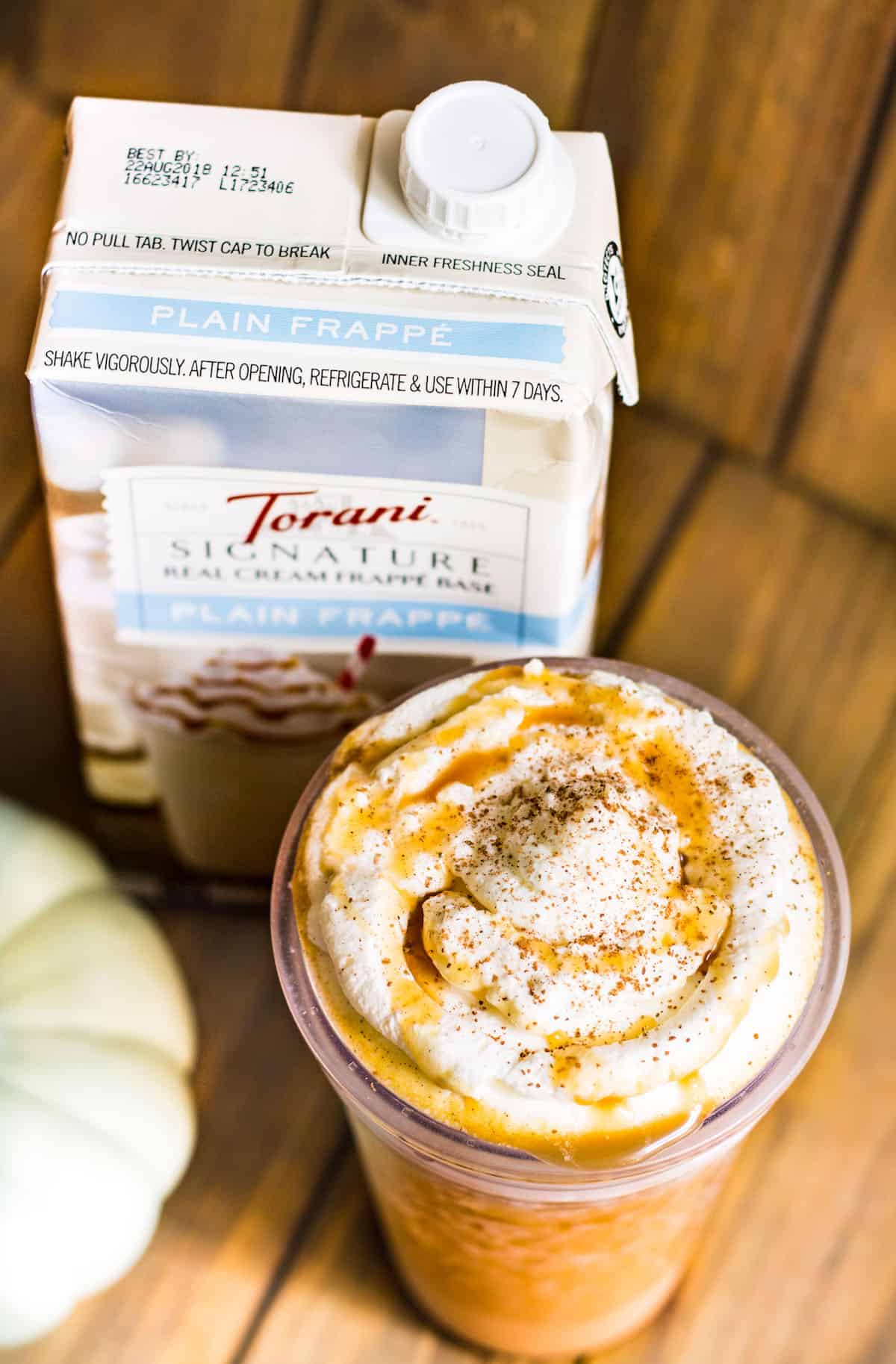 Pumpkin Spice Frappé: a rich and creamy blended drink flavored with pumpkin and pumpkin pie spice. Made with Torani Real Cream Plain Frappé Mix. Recipe via MonPetitFour.com #ad #MyToraniFrappe