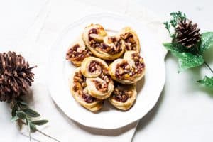 Savory Palmiers made with brie, walnuts, cranberry jelly, and Pepperidge Farm® Puff Pastry Sheets. A crowd-pleasing appetizer for any occasion or holiday! French recipe via MonPetitFour.com #ad #InspiredbyPuff