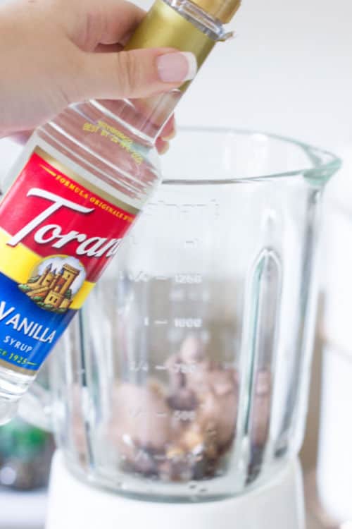 Torani Vanilla Syrup being added to s'mores milkshake
