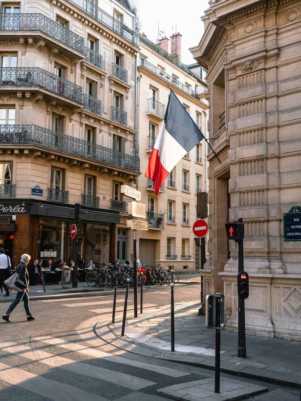France Flag on Gray Concrete Building Near Road
