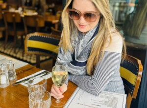 French wines to buy at trader joe's post with beeta drinking wine as the featured image
