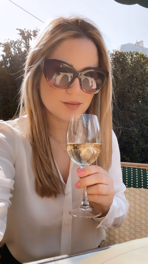 beeta drinking wine on the terrace